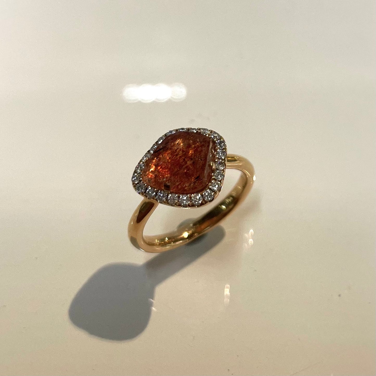Sunstone and Diamond Halo Ring